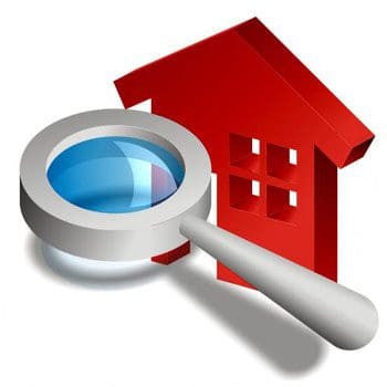 A magnifying glass and a red house